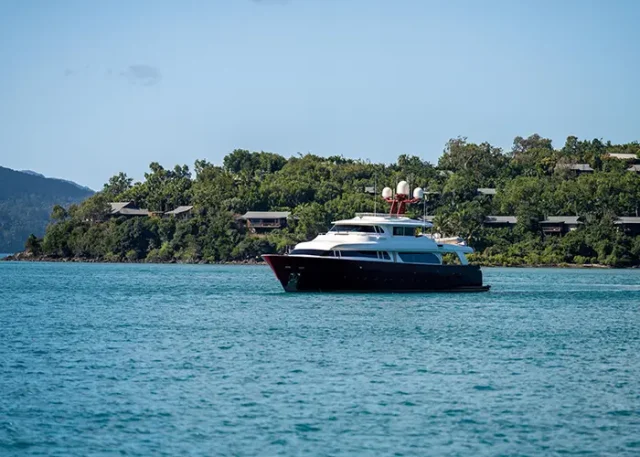 tourist-boats-tour-boats-whitsundays-queensland-australia-travellers-great-barrier-reef-coral-fish-tourism-yachts-young-people-partying-water copy
