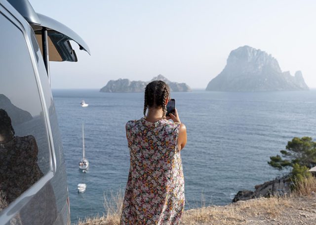 young-adult-using-digital-device-while-travelling copy