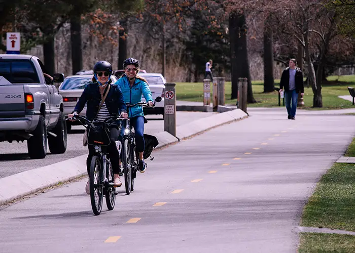 people cycling in a city