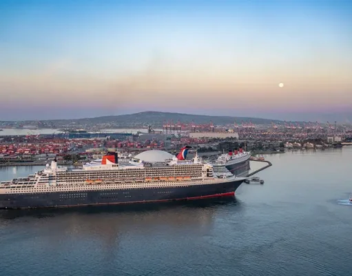 Cunard’s Flagship Queen Mary 2 Reunites with Her Legendary Namesake, The Queen Mary for the First Time in 20 Years