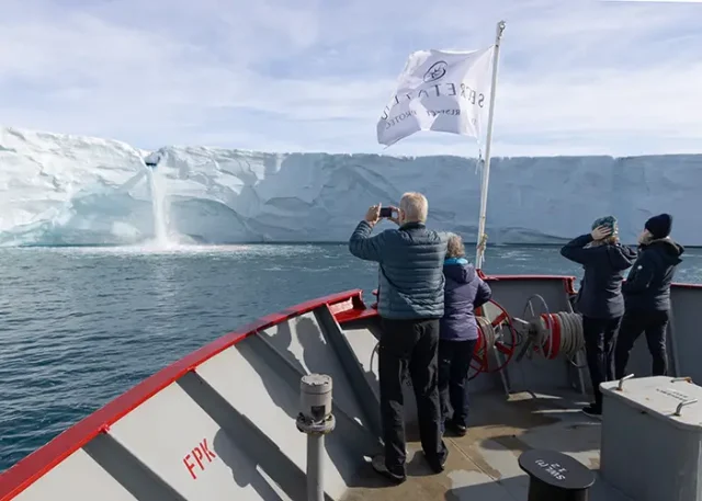 Guests-photographing-waterfall-at-brasvellbreen-Vikingfjord-Svalbard-July10-SandraWalser-Secret Atlas copy