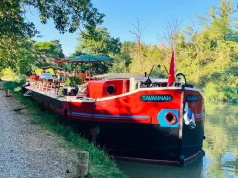 French Waterways Elevates Canal du Midi Voyage with Vintage Auto, Helicopter Tours