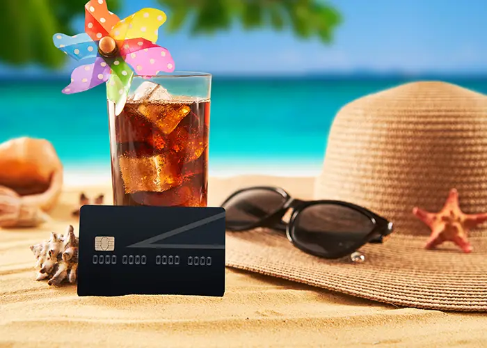 credit-card-with-straw-hat-sunglasses-and-cocktai-2026-03-05-11-37-51-utc copy