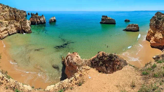 top-view-sandy-beach-dos-tres-irmaos-portimao-alvor-algarve-portugal-people-are-unrecognizable-three-shots-stitch-panorama copy