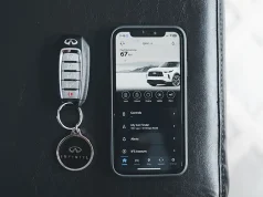 What Happens When You Lose a Car Key Far From Home A car key fob lying on gravel beside the wheel of a parked car