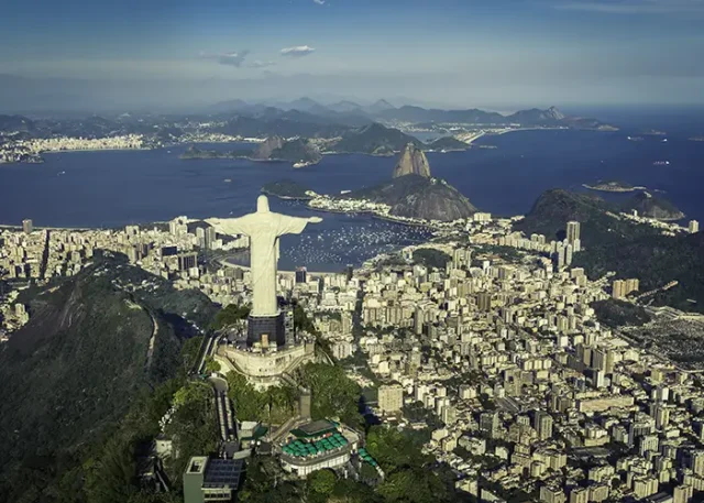 Rio De Janeiro, Brazil : Aerial View Of Christ And Botafogo Bay From High Angle