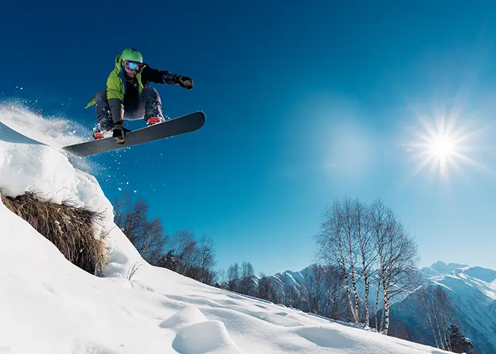 snowboarder-jumps-high-against-a-clear-blue-sky-2026-01-07-05-54-04-utc copy