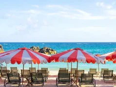 Bermuda in Fall 2026: New Beaches, Art, Food and World-Class Tennis Pink-sand beach and striped umbrellas at Palmetto Beach Club in Bermuda