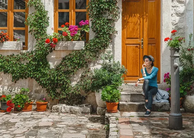 girl-in-front-of-italian-house copy