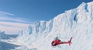 Antarctica From Above: New Helicopter Flights Offer a Spectacular Polar Adventure Scenic helicopter flight above Antarctica's snow-covered mountains and glaciers near Union Glacier.
