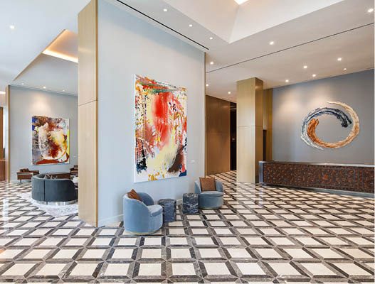 Lobby of The Joseph, a Luxury Collection Hotel, Nashville, featuring paintings by Jackie Saccoccio, ceramic art by Brie Ruais, and a custom designed, hand-tooled leather front desk by Lucchese 
