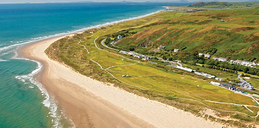 Aberdovey Golf Club Aerial view from estuary looking out to Cardigan Bay Golf Activities and Sports 