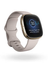 Product render of Fitbit Sense, 3QTR view, in Lunar White and Soft Gold 
