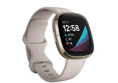 Product render of Fitbit Sense, 3QTR view, in Lunar White and Soft Gold stainless steel 