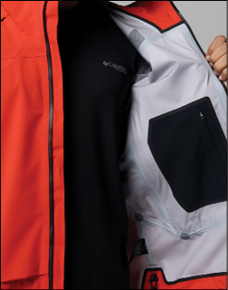 A person wearing a red jacket and a black shirt. Description generated by AI