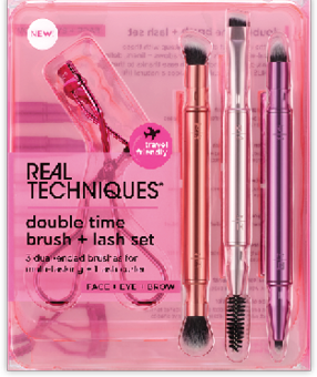 A pink package containing makeup brushes and a brush. Description generated by AI