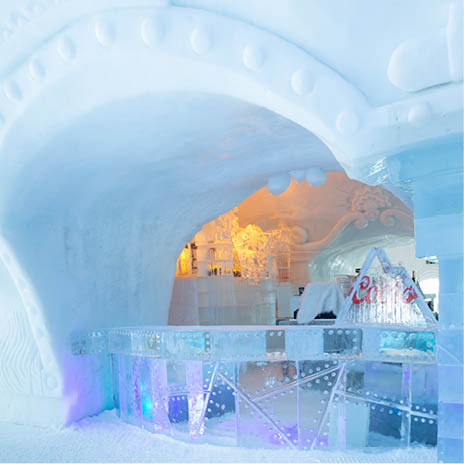 A large ice sculpture of a building. Description generated by AI