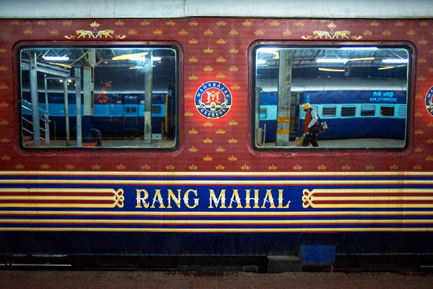 A train with the words Rang Mahal on it. Description generated by AI