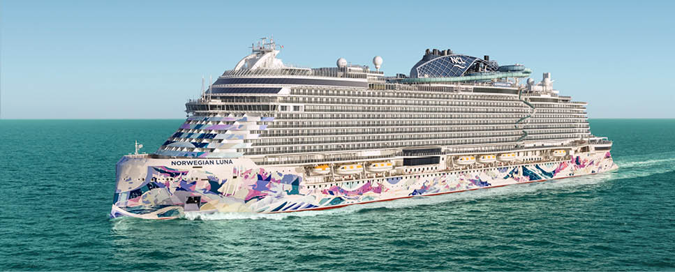 A large cruise ship with a blue and white color scheme. Description generated by AI