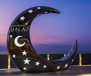 A large black and white moon sculpture. Description generated by AI