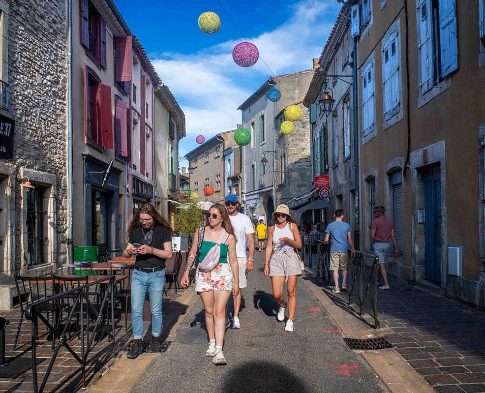Main shopping streets in the middle of medieval walled city Cite of Carcassonne, Languedoc, France