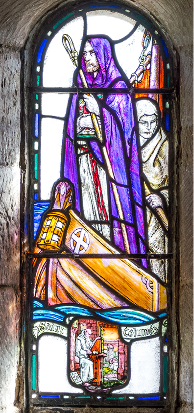 EDINBURGH, SCOTLAND - CIRCA APRIL 2016 - Stained glass church window with St Columba on a boat, an irish abbot and missionary to the Scots