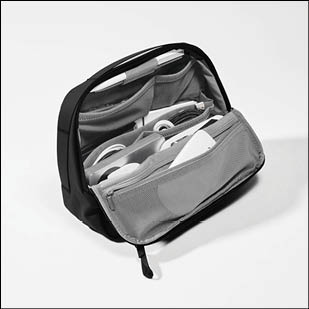 A black bag with a zipper. Description generated by AI