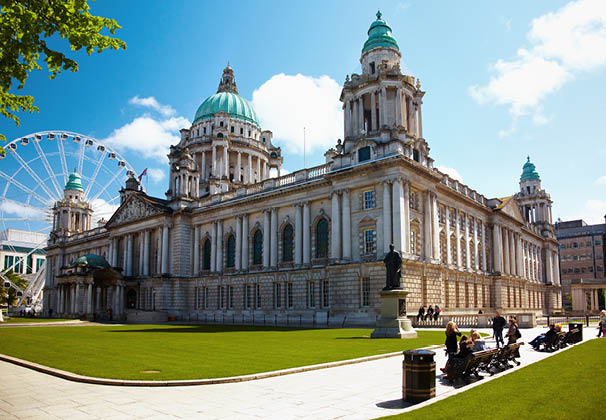 BELFAST, NORTHERN IRELAND - MAY 9, 2009:  Building of Belfast City Hall and Ferris wheel