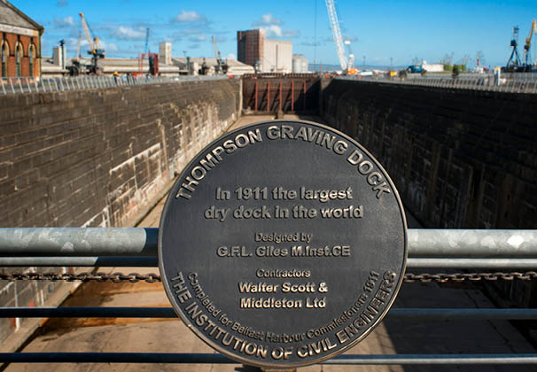 Former thompsons dry graving dock where the Titanic was built in titanic quarter queens island, Belfast Northern Ireland, UK. Thompson Graving Dock. Construction of the Thompson Graving Dock began in 1904 beside the pump-house that served the Alexandra Graving Dock. It was completed in time for the dry dock work on the RMS Olympic, which was completed and ready duty on 31st May 1911 – the same day that the hull of the Titanic was launched. 