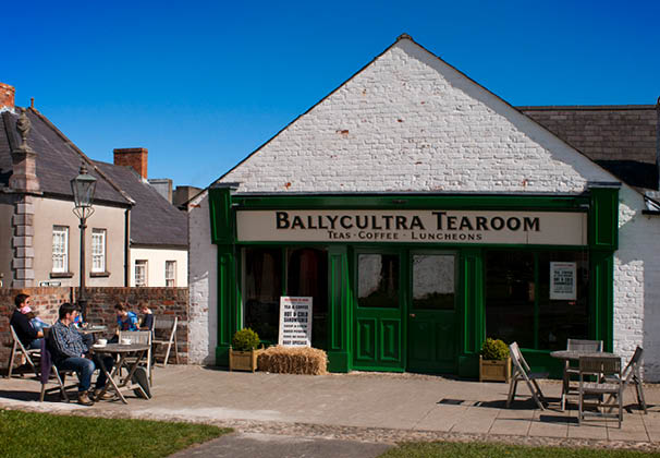 Ulster Folk and Transport Museum, Ballycultra town, Belfast, Northern Ireland, Britain, UK. Teas Coffee Luncheons. These four houses were built in 1870s as the town of Dromore expanded. In 1903, the larger house at the end of the terrace, with two ground floor rooms, was occupied by a cobbler, Joseph Robert Magill.