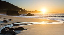 Sunrise in Rio, capturing Ipanema Beach, the town of Leblon and Sugarloaf Mountain 