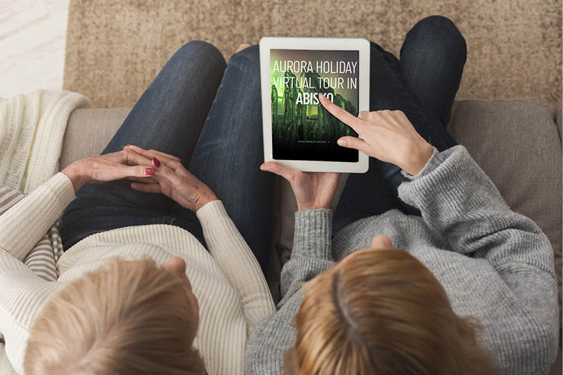 Adult woman and daughter using digital tablet with blank screen for advertisement, copy space  Woman pointing on it  Generation, relationship, modern technology concept, top view