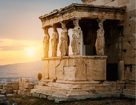 Figures of Caryatids Porch of the Erechtheion on the Parthenon on Acropolis Hill, Athens, Greece  Sunset time