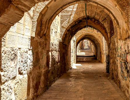 JERUSALEM, ISRAEL - JULY 7, 2014: Sreet of Jerusalem Old City Alley made with hand curved stones  Israel, Middle East