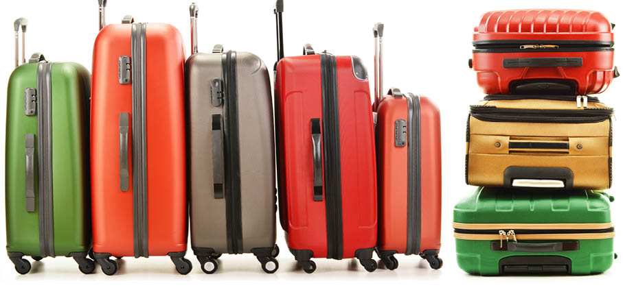 Luggage consisting of large suitcases and rucksack isolated on white 