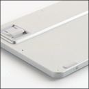 A white object with a slot on the side. AI generated content