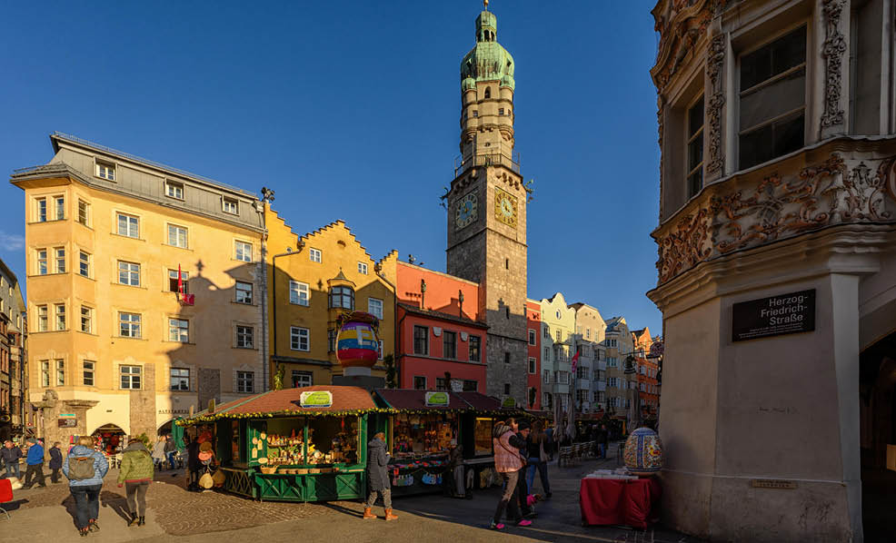 A large clock tower is visible in the background of a busy city street. AI generated content