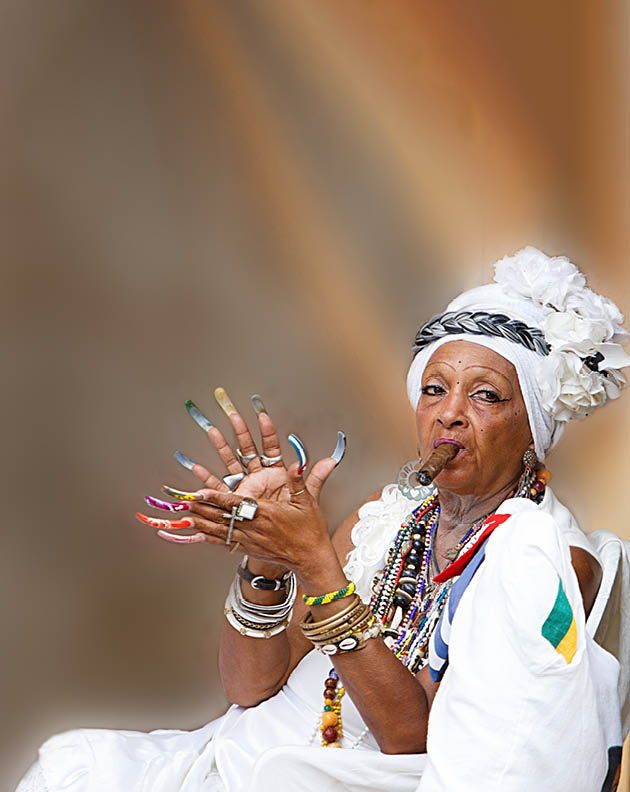 cuban santona smoking a cigar , havana - cuba