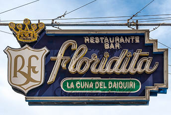 Bar Restaurant Floridita turned off neon sign  Old buildings on the background El Floridita is a historic fish restaurant and cocktail bar very popular with tourist visitors