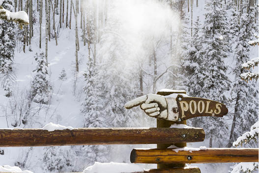 Strawberry Hot Springs surrounded by winter forest 