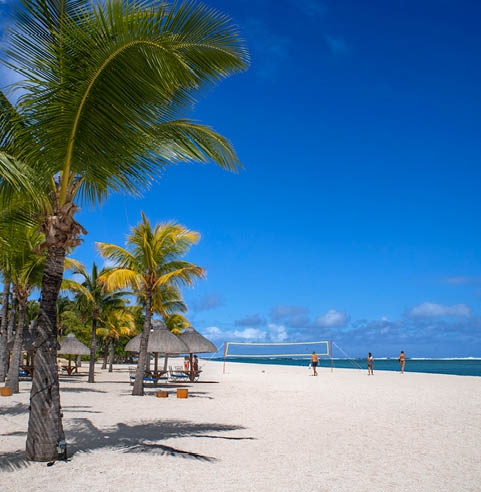 Tourits in le Morne public beach next to the LUX Le Morne five stars resort, Mauritius