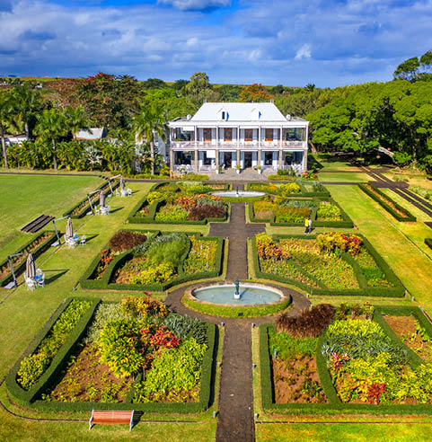 French gardens in Le Ch teau de Bel Ombre castle, old castle in tropical garden in Bel Ombre beach, Mauritius. You can choose to enjoy a typical lunch in the magnificent French gardens, opt for a gourmet wine-pairing dinner under the varangue, enjoy a sundowner with spectacular views over the Indian Ocean and the golf course, or even spend the night in the Suite of Le Ch teau. 