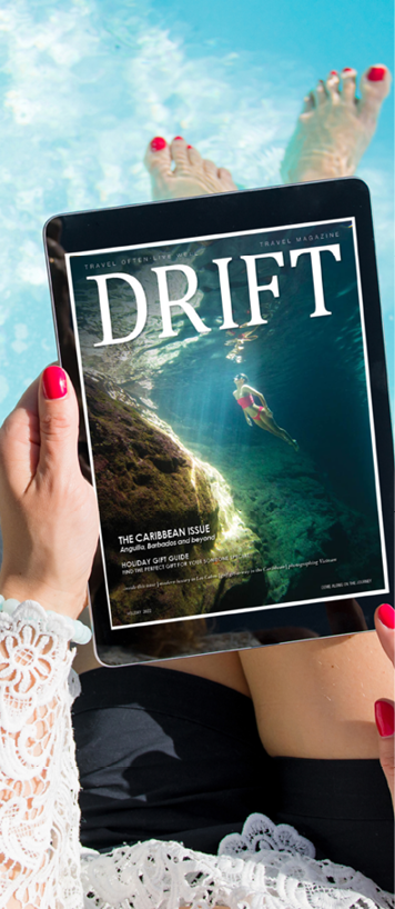 Woman reading emagazine on tablet computer.