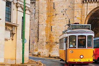 Lisbon, Portugal - May 2, 2012 - The Lisbon cityscape with yellow tram # 28 in Largo Se.