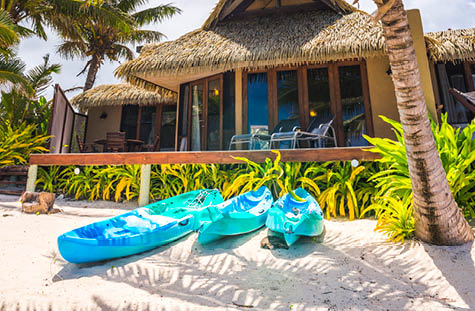 Sea view Luxury Villas on the beach front with tropical palm trees and a sandy beach, Muri, Rarotong